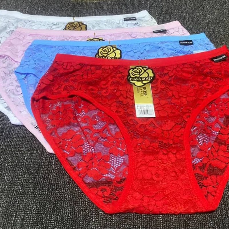 Lace panties in white, pink, blue and red laid out in a row