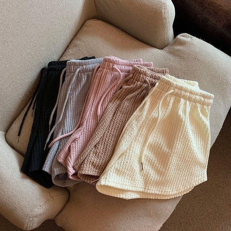 Textured drawstring lounge shorts in black, grey, pink, brown and cream