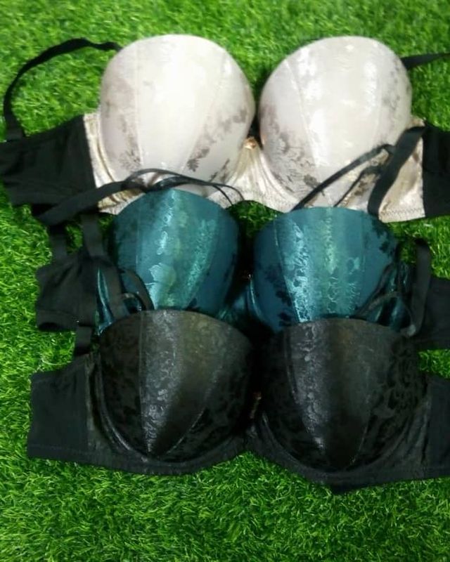 Satin padded bras in ivory, teal and black